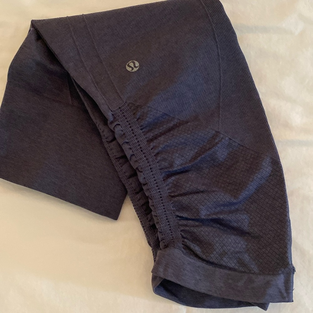 Lululemon crop pant.  Rugged.  Eggplant color. Perfect condition- no tag.